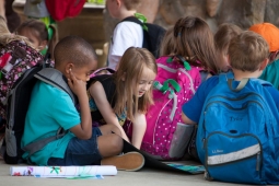 Children share their latest art projects outside Mt Laurel Elementary School.   