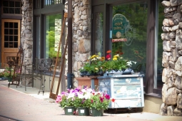 Residents purchase beautiful flowers outside Jimbo's Soda Fountain.    