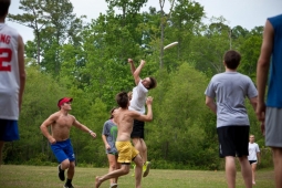 Residents play a spontaneous game of Frisbee on one of Mt Laurel's many green spaces.   