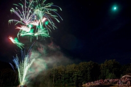 Fireworks paint the sky with color as residents gather to celebrate the 4th of July at Spoonwood Lake.  