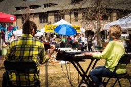 Live music creates a vibrant atmosphere as locals peruse artisan booths at the Mt Laurel Fall Festival.   