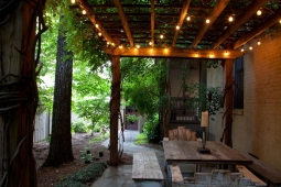 Gorgeous scenery makes this backyard patio the perfect entertainment space.    